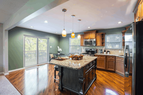 remodeled kitchen with hardwood floors and island in Central Illinois by True Craft Remodelers