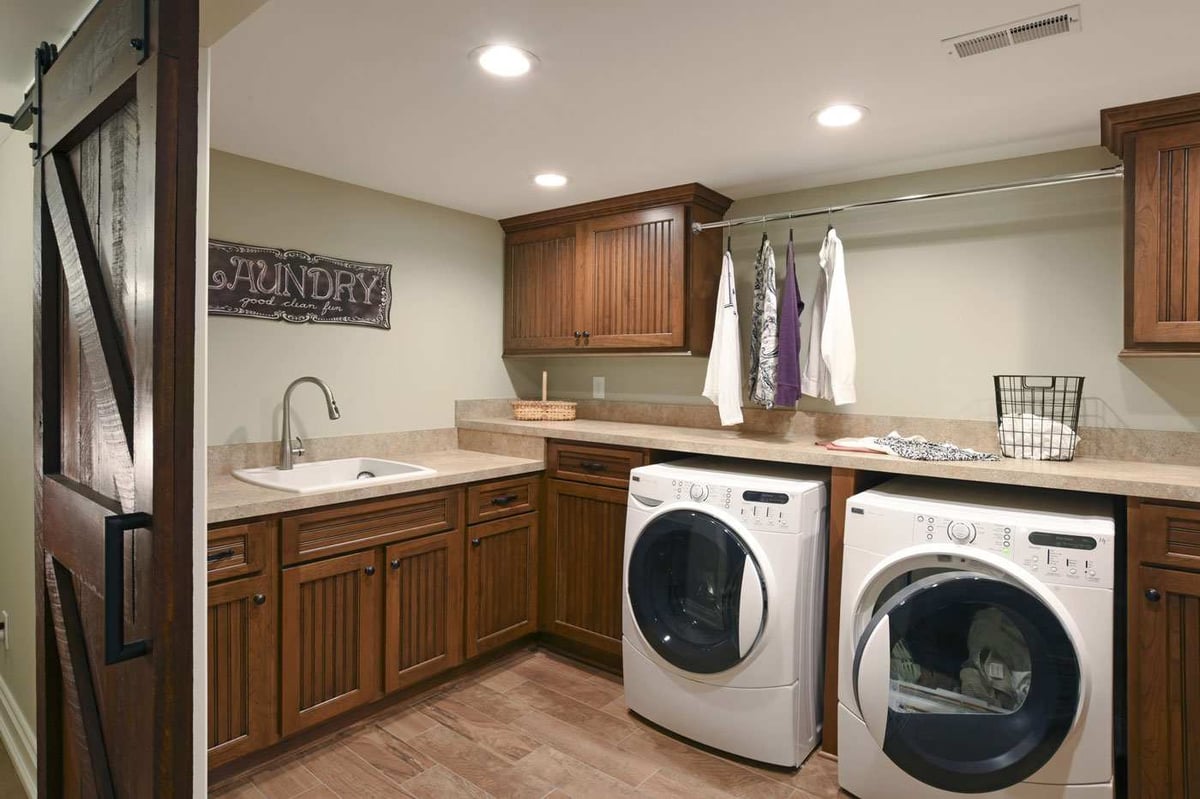 remodeled laundry room with sink in Central Illinois by True Craft Remodelers