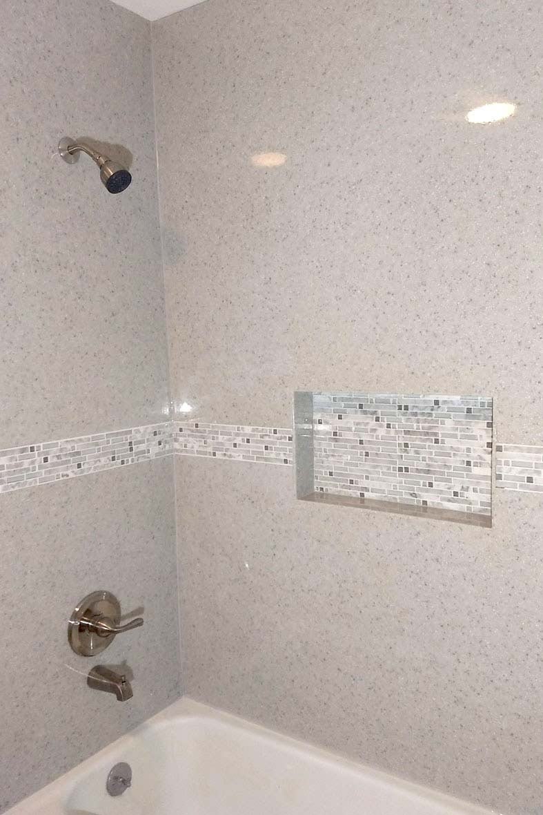walk in shower with white tile in remodeled bathroom in Central Illinois by True Craft Remodelers