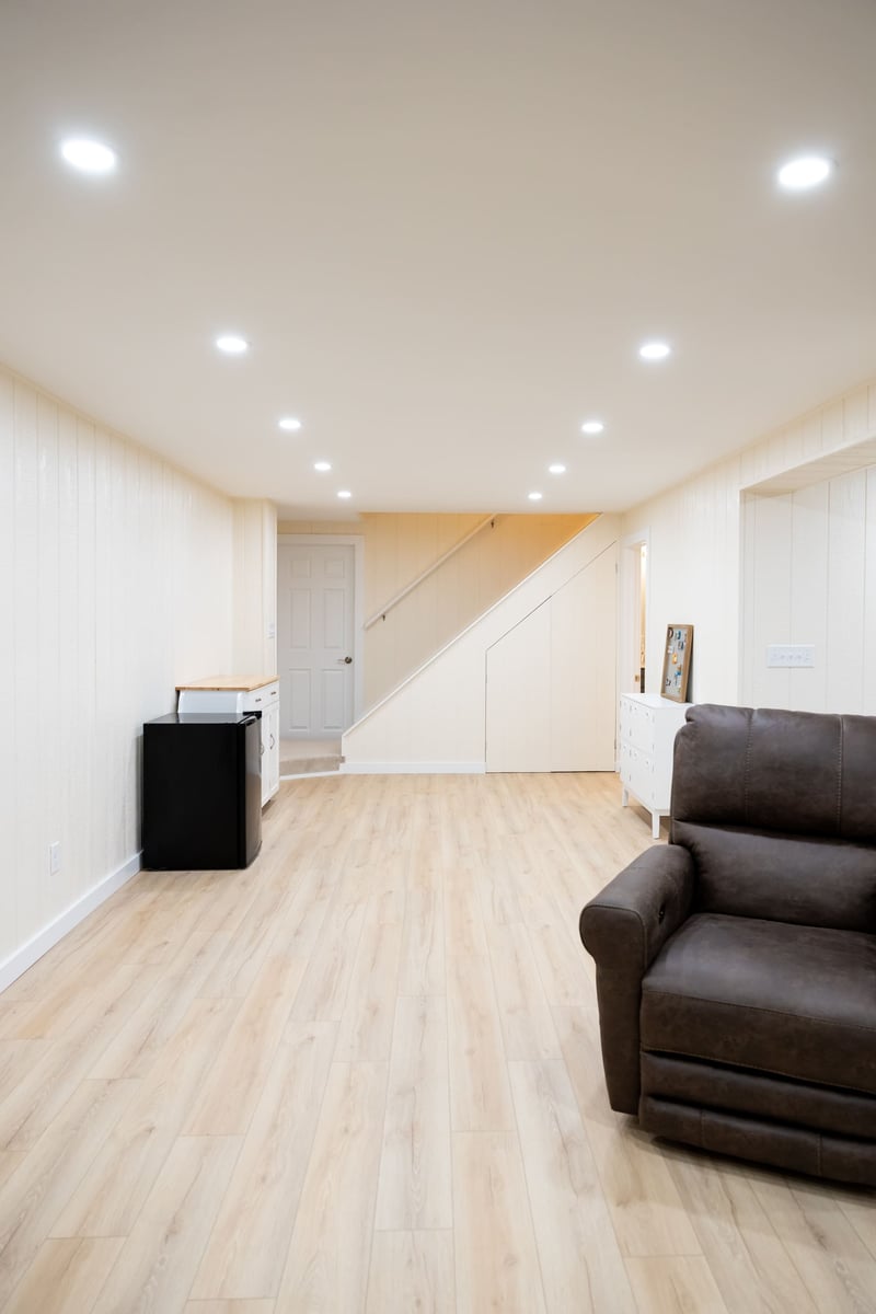 White Walls in Family Room In Basement Remodel By True Craft Remodelers