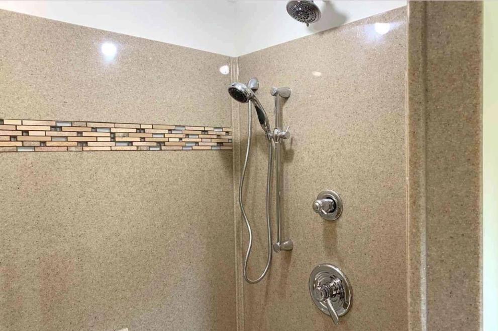 close up of shower head in remodeled bathroom in Central Illinois by True Craft Remodelers